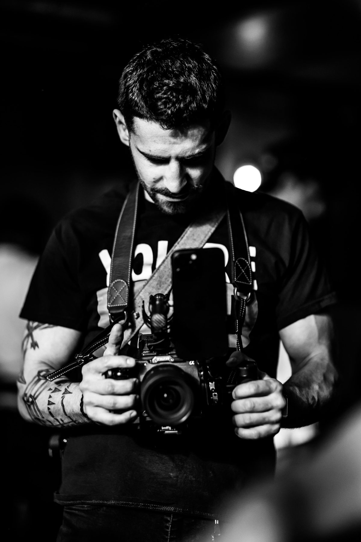 Alexander Zwick shooting with a camera to his eye