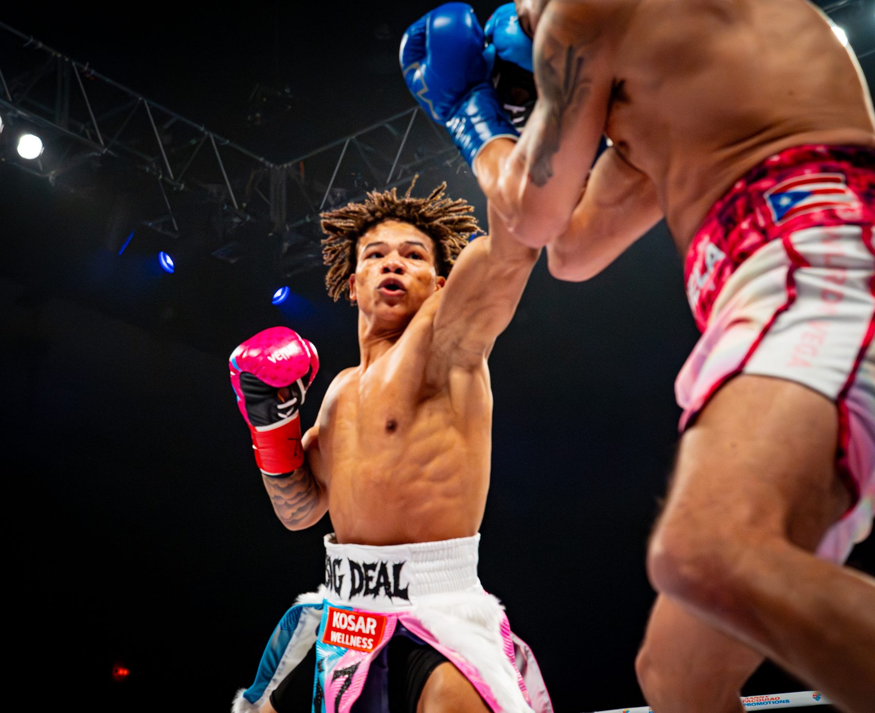 A punch landing clean, both fighters in frame