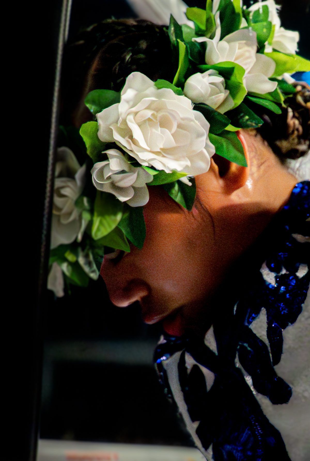 A fighter in a flower crown before the walkout