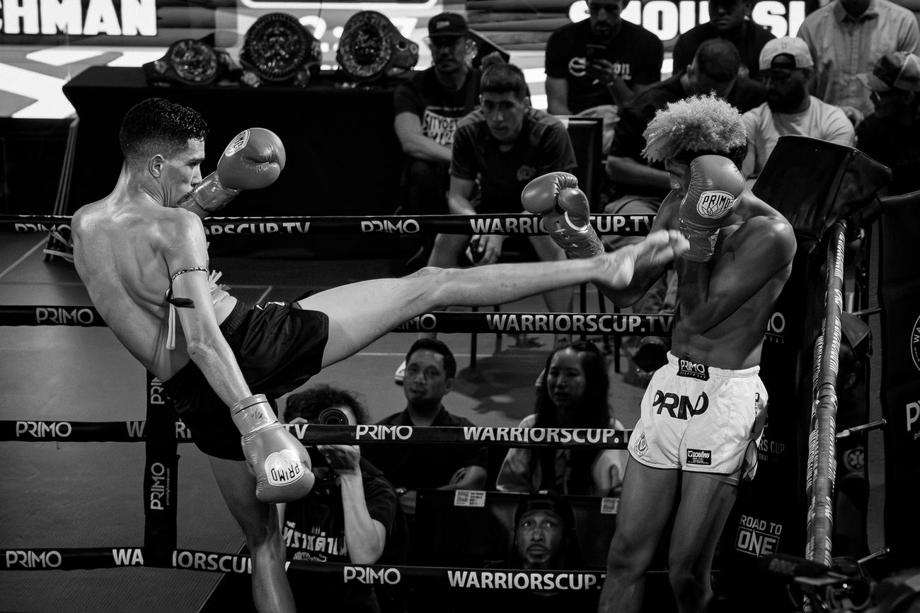 High kick thrown across the ring