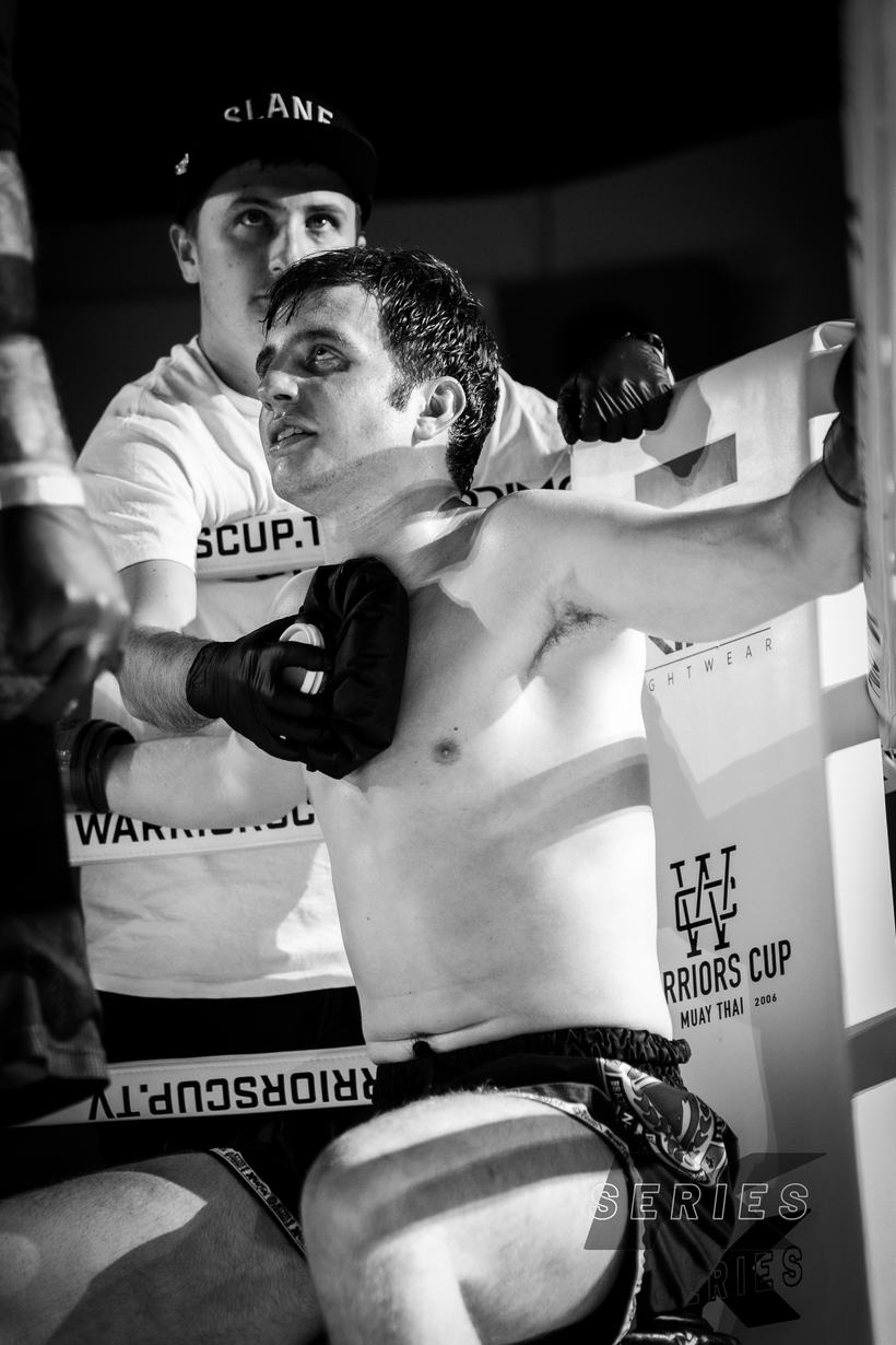 Fighter and his cornerman in the moments after a round