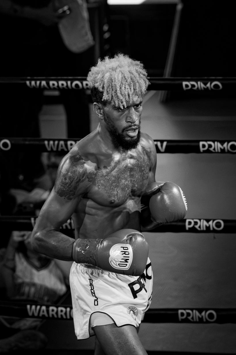 Fighter standing in his corner before the round starts