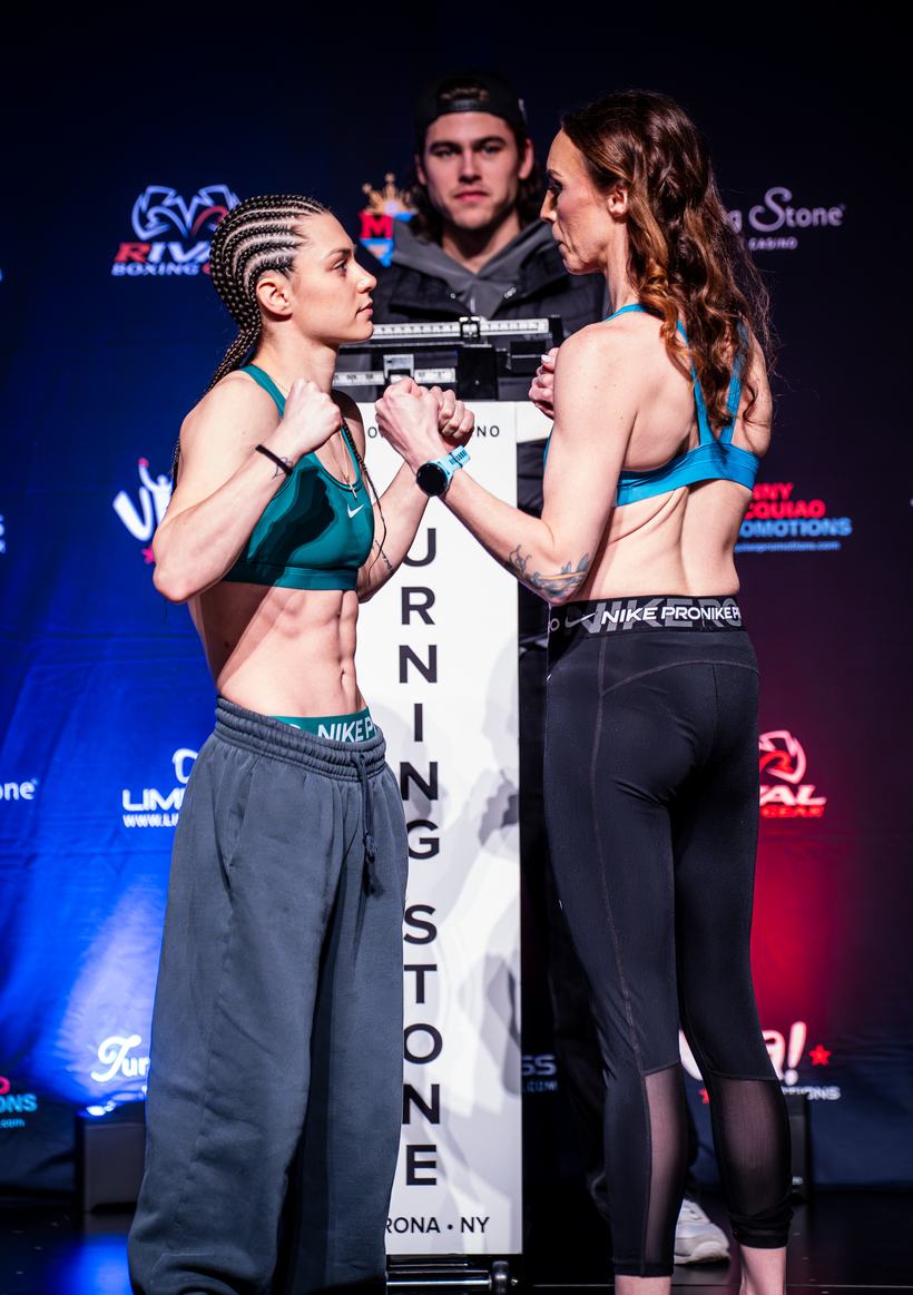 Two fighters facing off at the weigh in