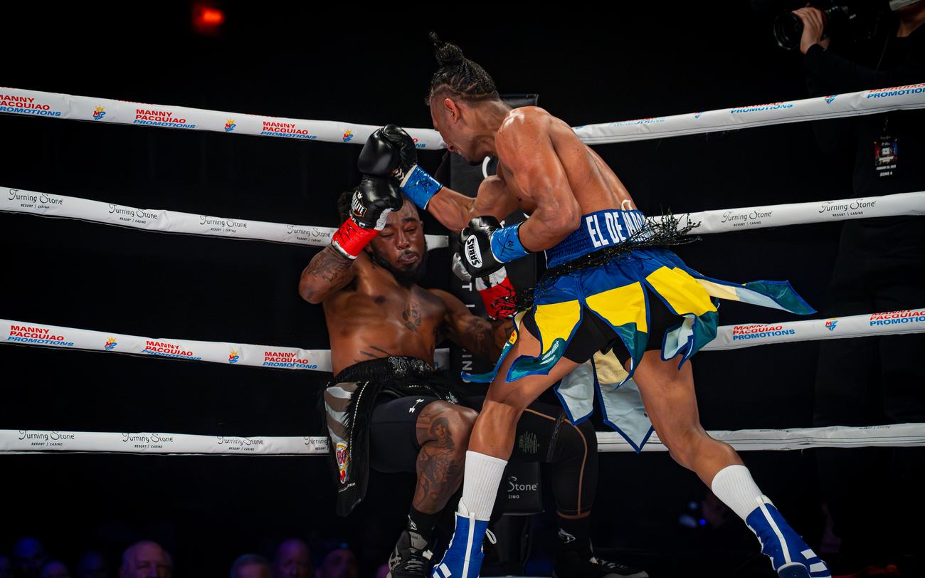 Punch connecting clean under the Manny Pacquiao Promotions ropes