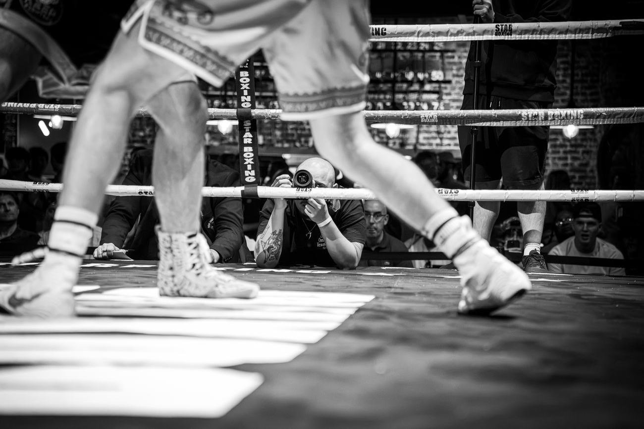 Fighters moving across the canvas, shot low from the floor
