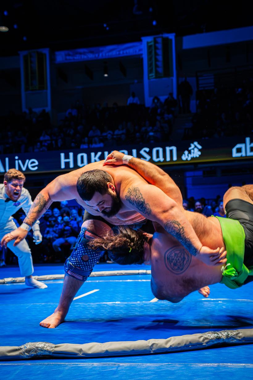 Takedown finishing on the arena mat