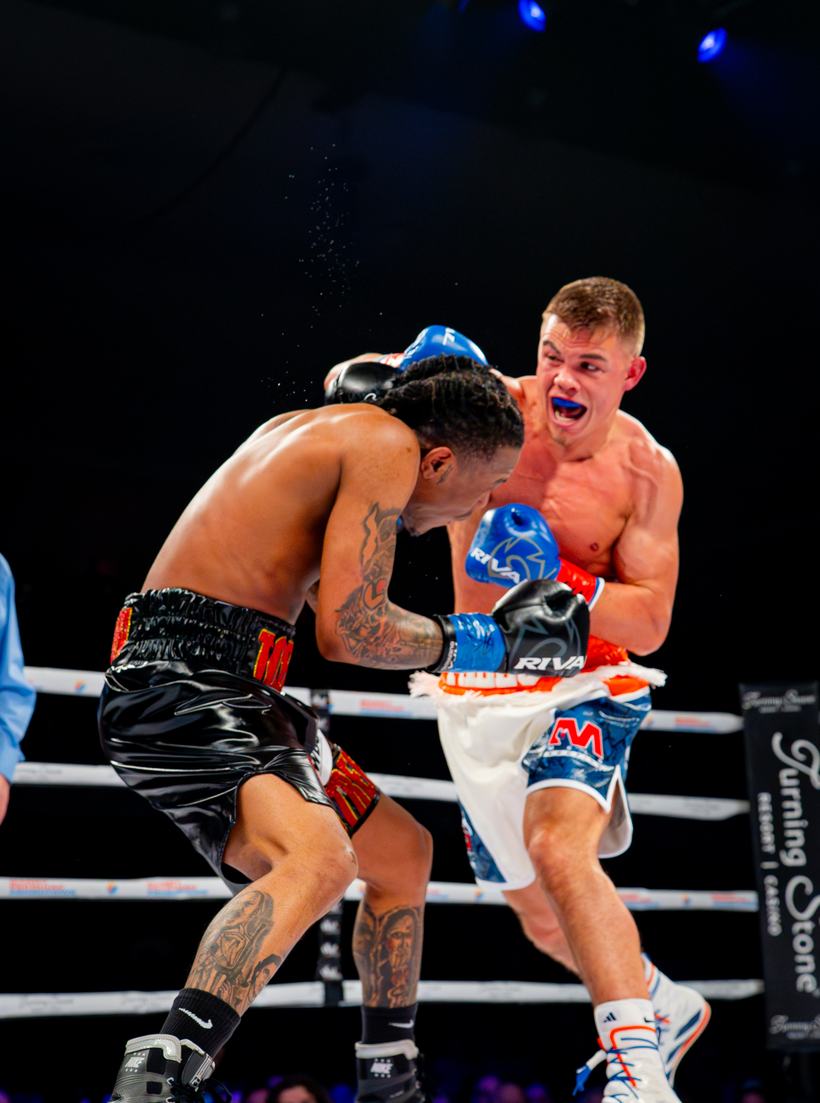 Boxers trading punches at close range