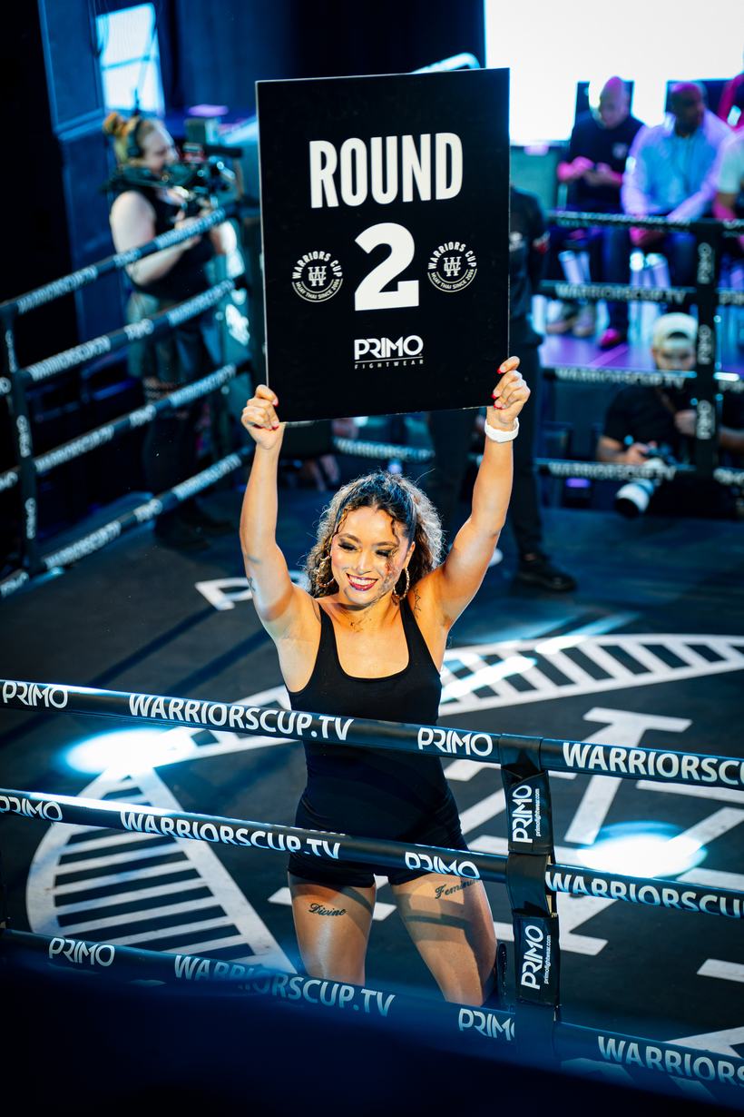 Ring card holder carrying the round two board